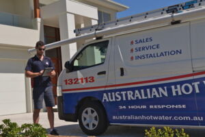 Technician next to Australian Hot Water Service Van