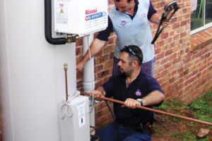 Technicians installing Hot Water Systems